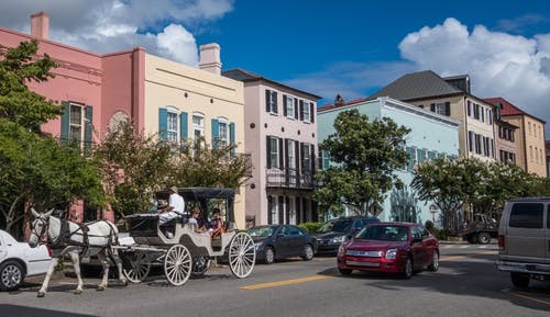 A horse-drawn carriage tour in Charleston, symbolizing historical charm