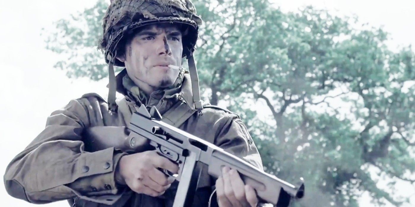 Ronald Speirs (Matthew Settle) pointing a gun in Band of Brothers.