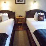 Image of a room at Guides Inn with two queen beds