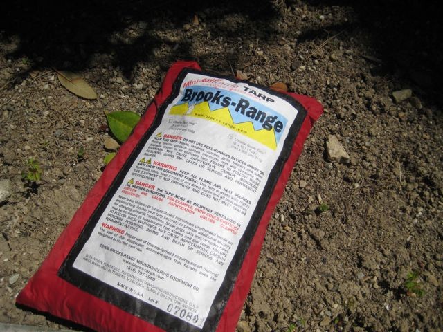 Packed Brooks Range Mini Guide Ultralite Tarp showing its small pack size