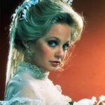 Charlene Tilton as Lucy Ewing in a promotional image for the Dallas episode guide, highlighting a beloved character from the long-running TV drama series.