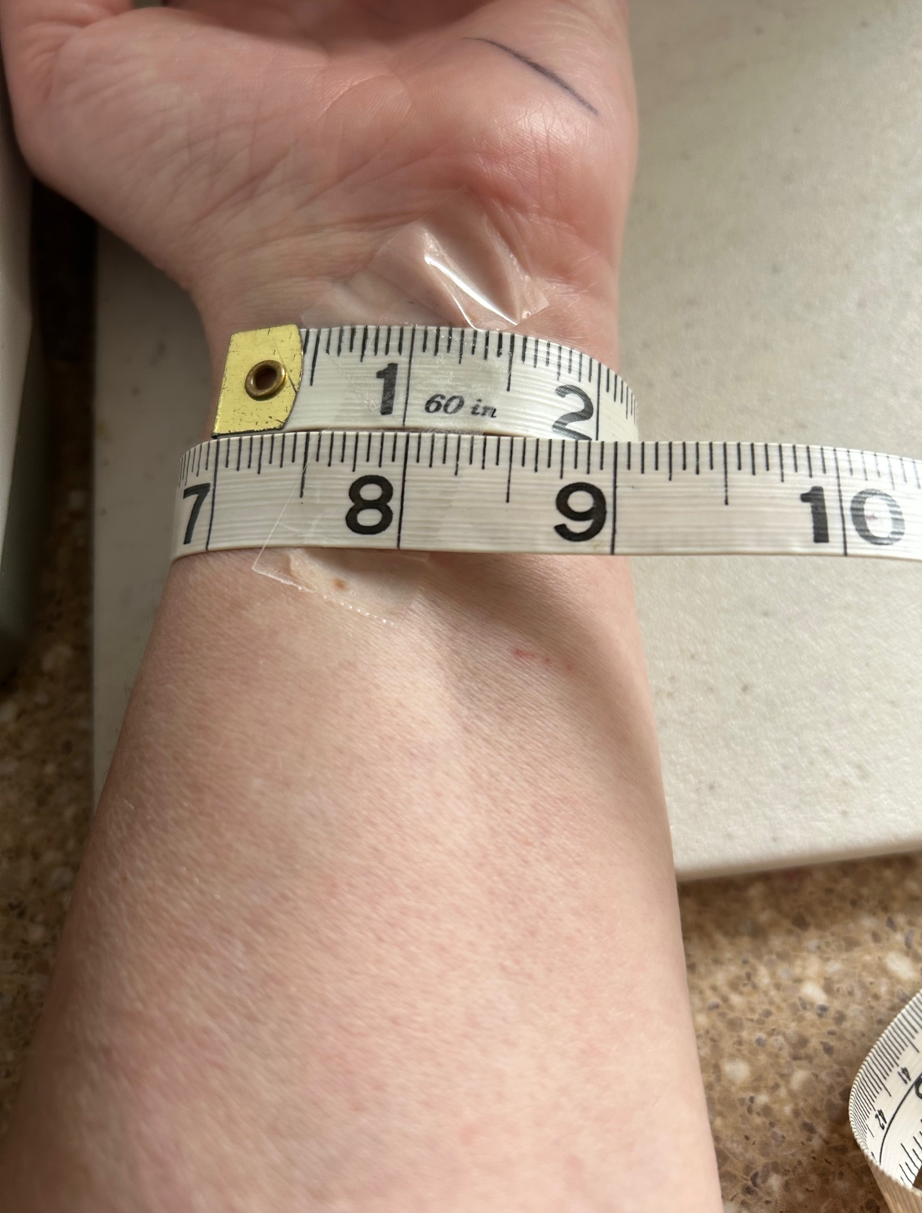 Measuring wrist with string for Apple Watch band size