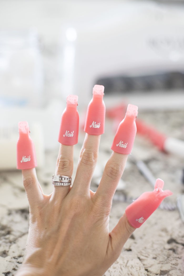 Preparing for gel nail removal with acetone and clips