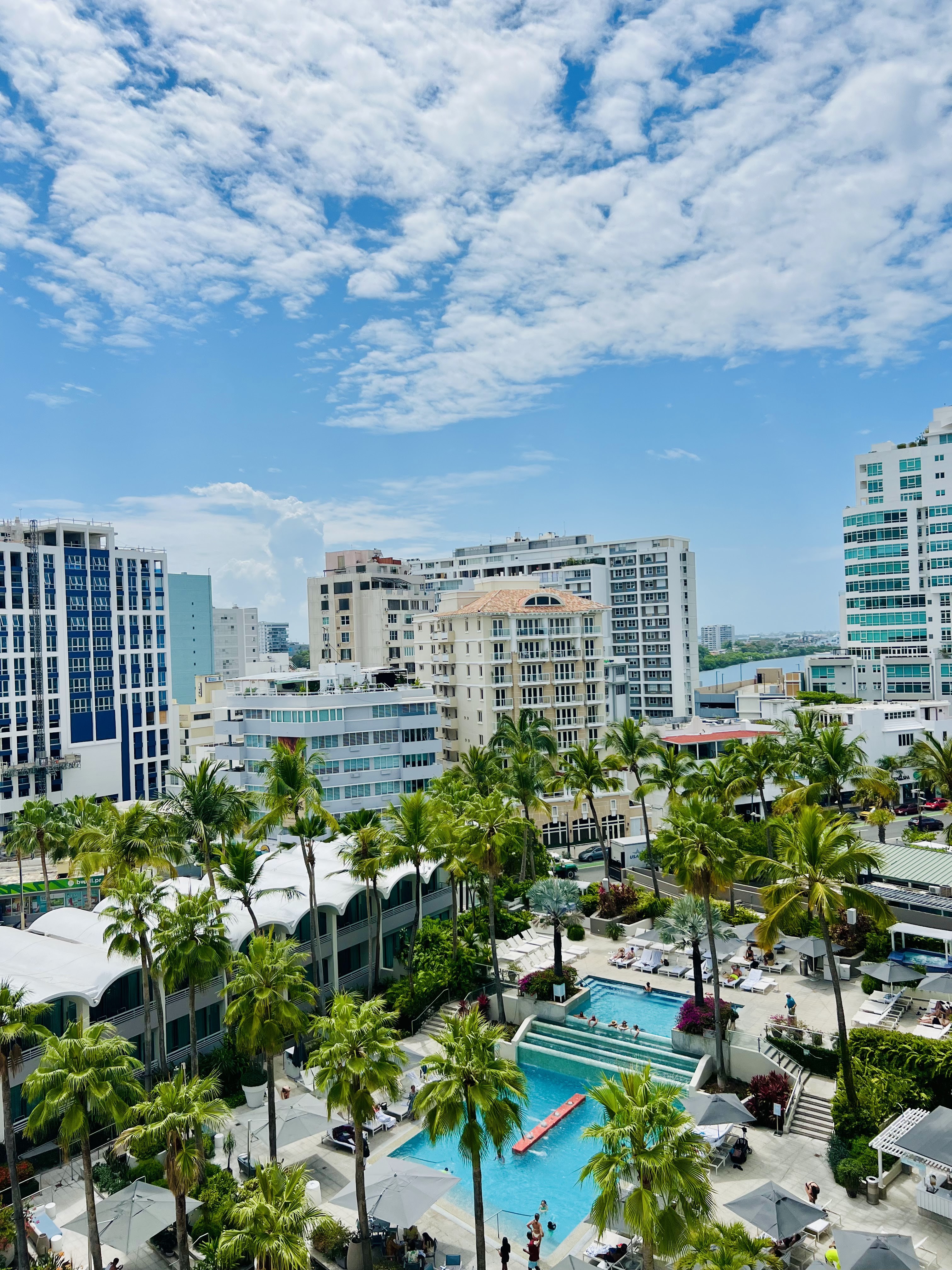 An elevated view of the multiple pools at La Concha Renaissance resort in San Juan