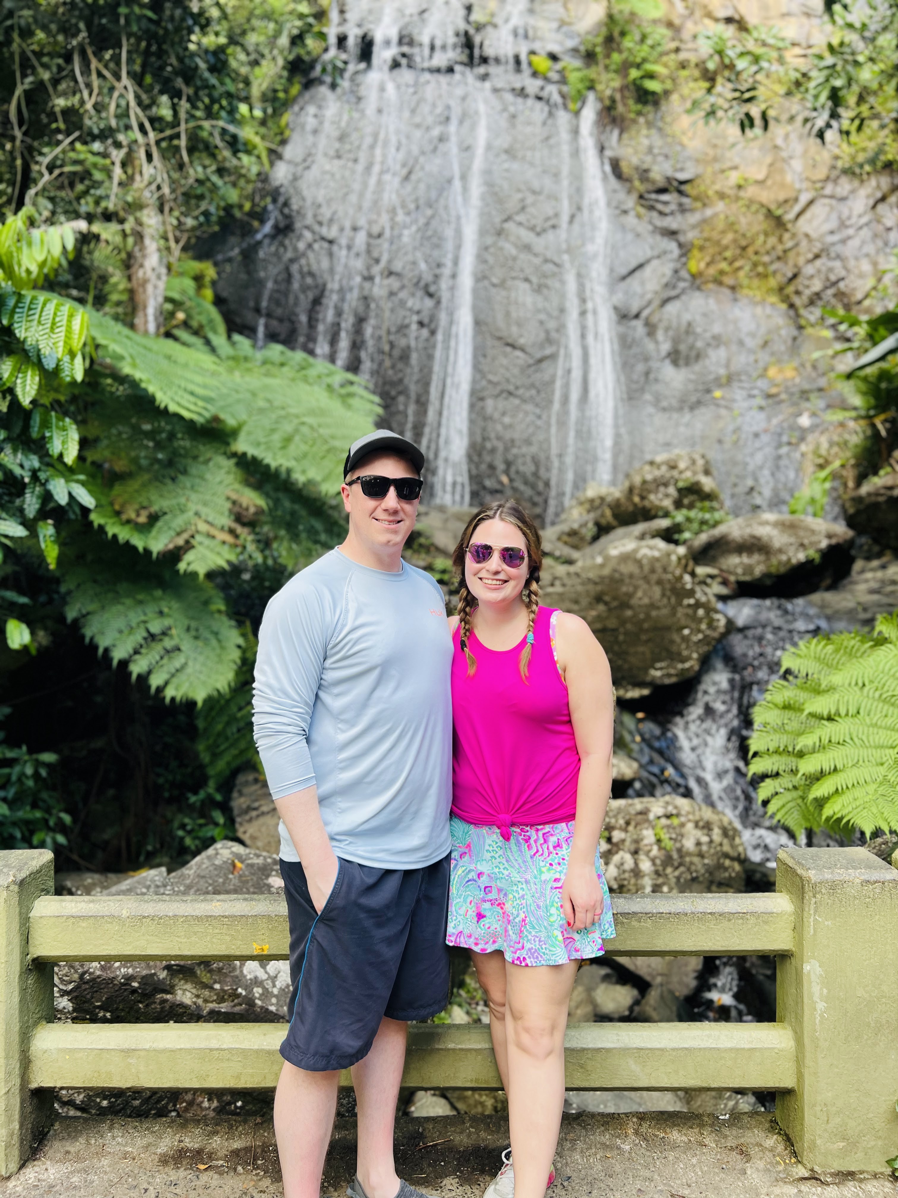 A scenic overlook in El Yunque National Forest with mountains and lush vegetation in view