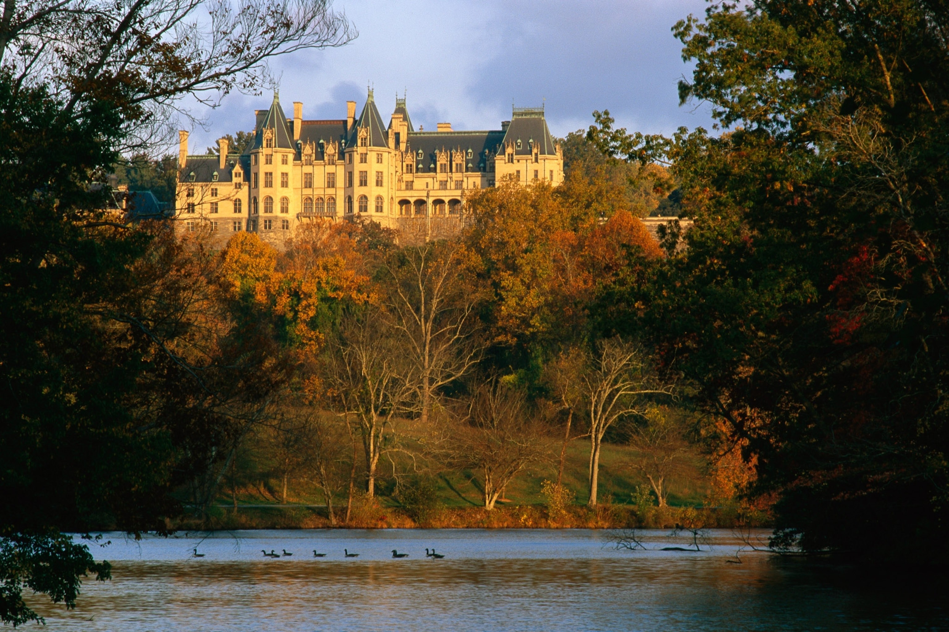 Autumn leaves frame the Biltmore Estate in Asheville, North Carolina.