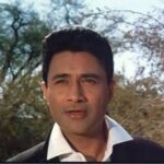 Dev Anand as Raju in Guide 1965 movie, a Bollywood adaptation of R.K. Narayan's novel.