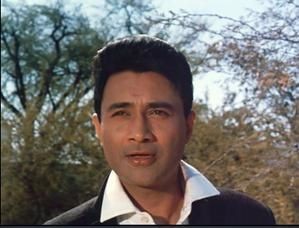 Dev Anand as Raju in Guide 1965 movie, a Bollywood adaptation of R.K. Narayan's novel.