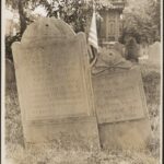 Gravestone of Captain Daniel Malcolm in Copp's Hill Burying Ground, Boston, highlighting historical burial sites.