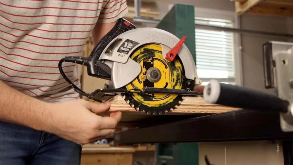 Close-up of a circular saw on a track saw system, highlighting potential slop and uneven edges in retrofit kits.