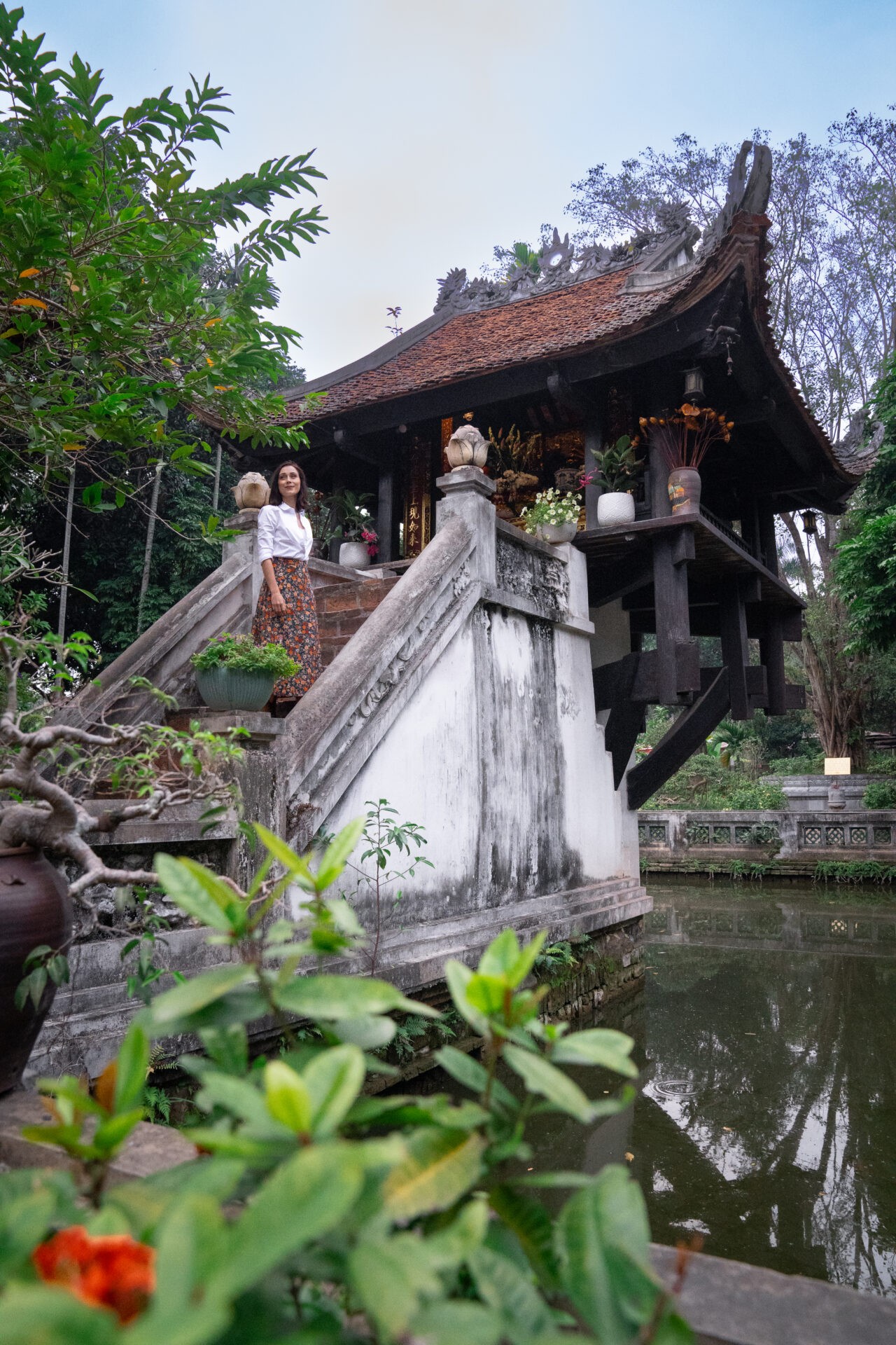 One Pillar Pagoda in Hanoi Vietnam, reflecting in the water