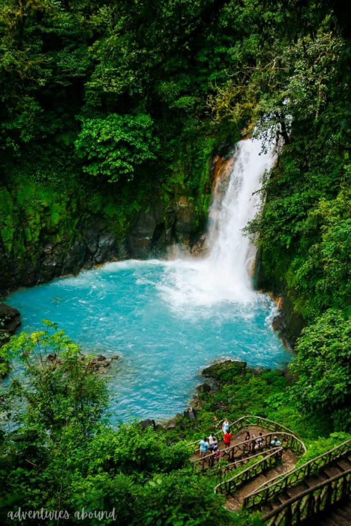 Waterfall in Costa Rica surrounded by lush green jungle